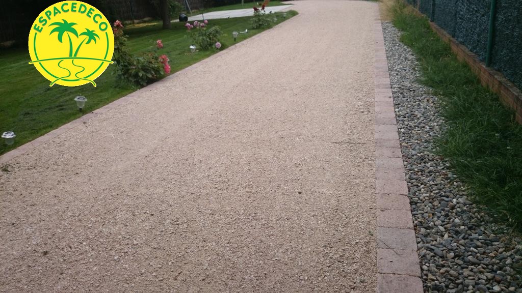 Création d’une entrée en gravier beige avec système drainant Isle-Jourdain