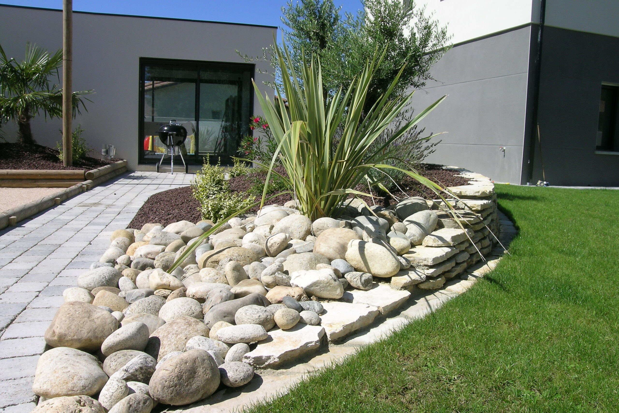 Plantations Décorations avec bordures et pavage